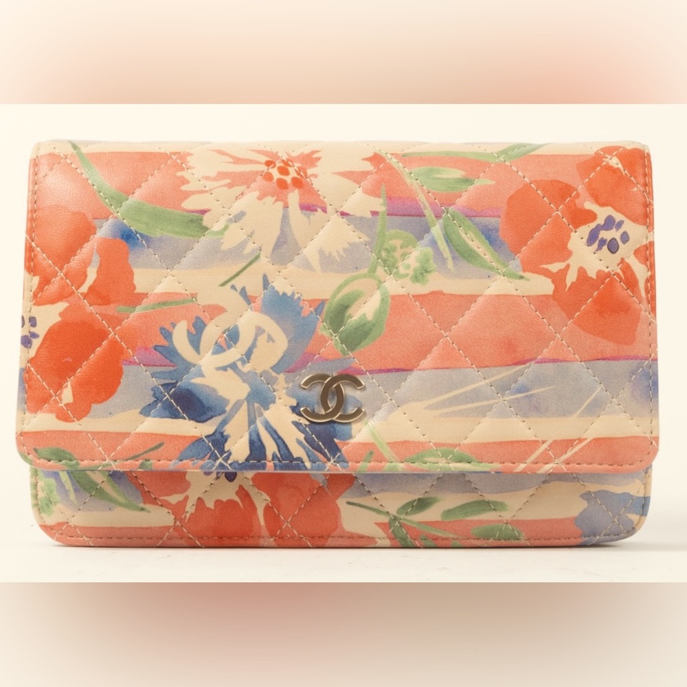 CHANEL, UNIQUE, & INCREDIBLY PRICED, Floral Chain wallet on chain crossbody.